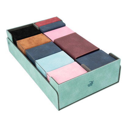 CaraTex BoxBay 1000 turquoise Card Game storage box filled with assorted deck boxes and token boxes for trading card game decks.