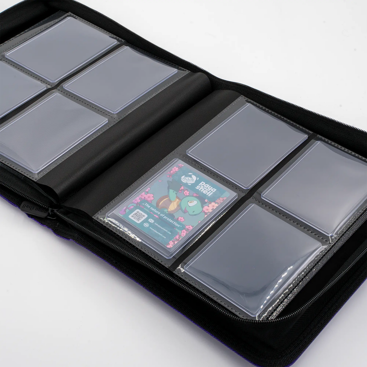 inside view of caratex card shield zip-up album binder for standard and japanese size tcg trading cards in toploader card shields with 8 sideloading pockets and 20 double-sided black pages 