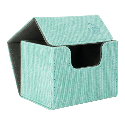 open turquoise resistant denim-like caratex cardcove 100+ deck box with magnetic cover and extra-wide interior for outer sleeves that fits up to 100 double-sleeved or 120 single-sleeved standard or japanese size tcg trading cards