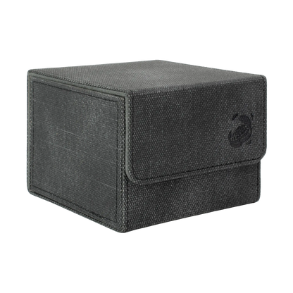 closed black resistant denim-like caratex cardcove 133+ deck box with magnetic cover and extra-wide interior for outer sleeves that fits up to 133 double-sleeved or 160 single-sleeved standard or japanese size tcg trading cards