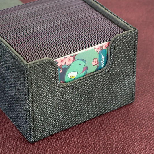 detail view of opened black caratex cardcove deck box filled with up to 133 double-sleeved tcg cards