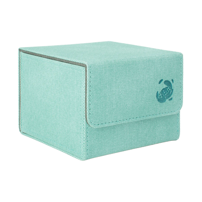 closed turquoise resistant denim-like caratex cardcove 133+ deck box with magnetic cover and extra-wide interior for outer sleeves that fits up to 133 double-sleeved or 160 single-sleeved standard or japanese size tcg trading cards