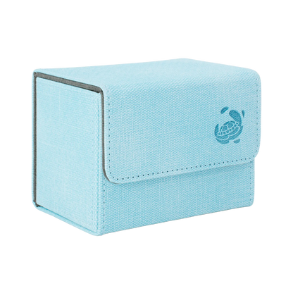 closed light blue resistant denim-like cardcove 80+ deck box with magnetic cover and extra-wide interior for outer sleeves that fits up to 80 double-sleeved or 100 single-sleeved standard or japanese size tcg trading cards