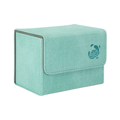 closed turquoise resistant denim-like caratex cardcove 80+ deck box with magnetic cover and extra-wide interior for outer sleeves that fits up to 80 double-sleeved or 100 single-sleeved standard or japanese size tcg trading cards