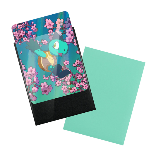 front and back of turquoise matte textured dual reef sleeves with black inside and clear front for tcg standard size trading cards