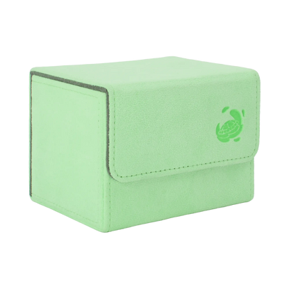 closed pastel green soft resiplush cardcove 100+ deck box with magnetic cover and extra-wide interior for outer sleeves that fits up to 100 double-sleeved or 120 single-sleeved standard or japanese size tcg trading cards
