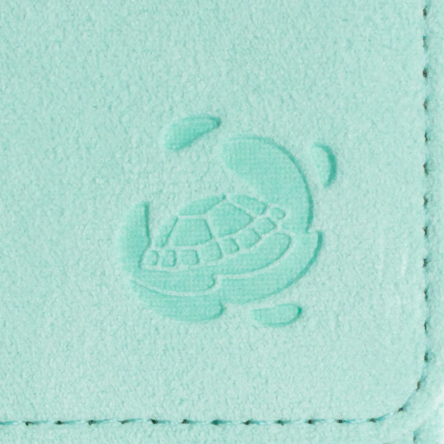 close-up view of payashell logo embossing on soft resiplush cardcove deck box