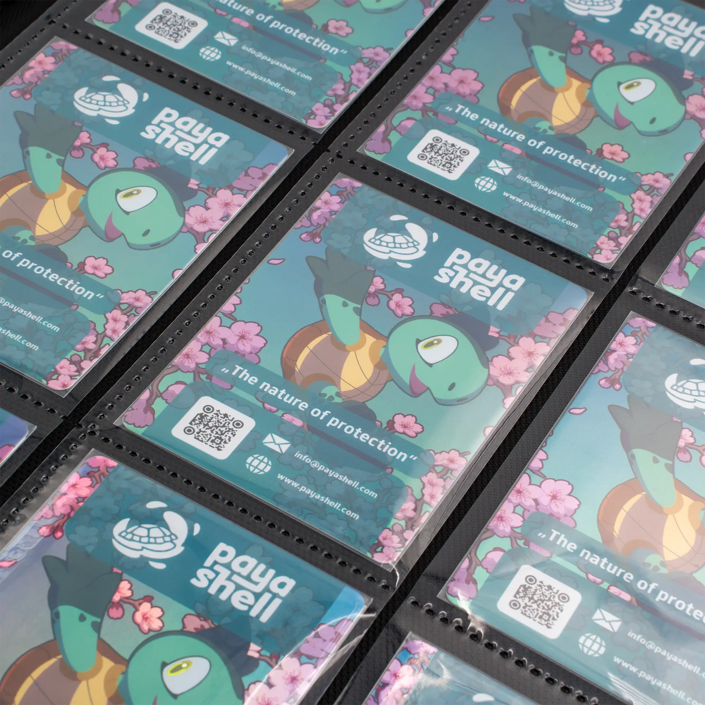 inside view of cards in resiplush zip-up album binder for standard and japanese size tcg trading cards with 18 sideloading pockets, 20 double-sided, black pages and 3 extra mesh pockets for toploader card shields or magnetic card holders