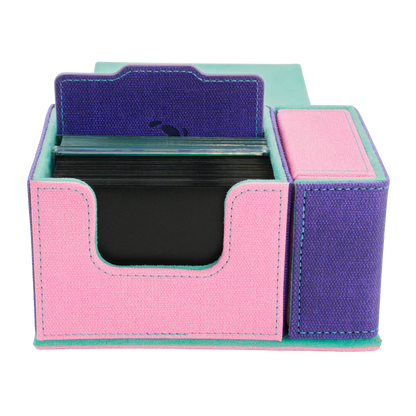 front view of multi-color pastel pink, purple and turquoise dual material resistant denim-like caratex and soft resiplush tourneycove 120+ tournament deck box for tcg trading cards, with removable, magnetic compartment for dice, tokens and counters and extra card divider